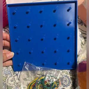 Blue Geoboard with Rubber Bands